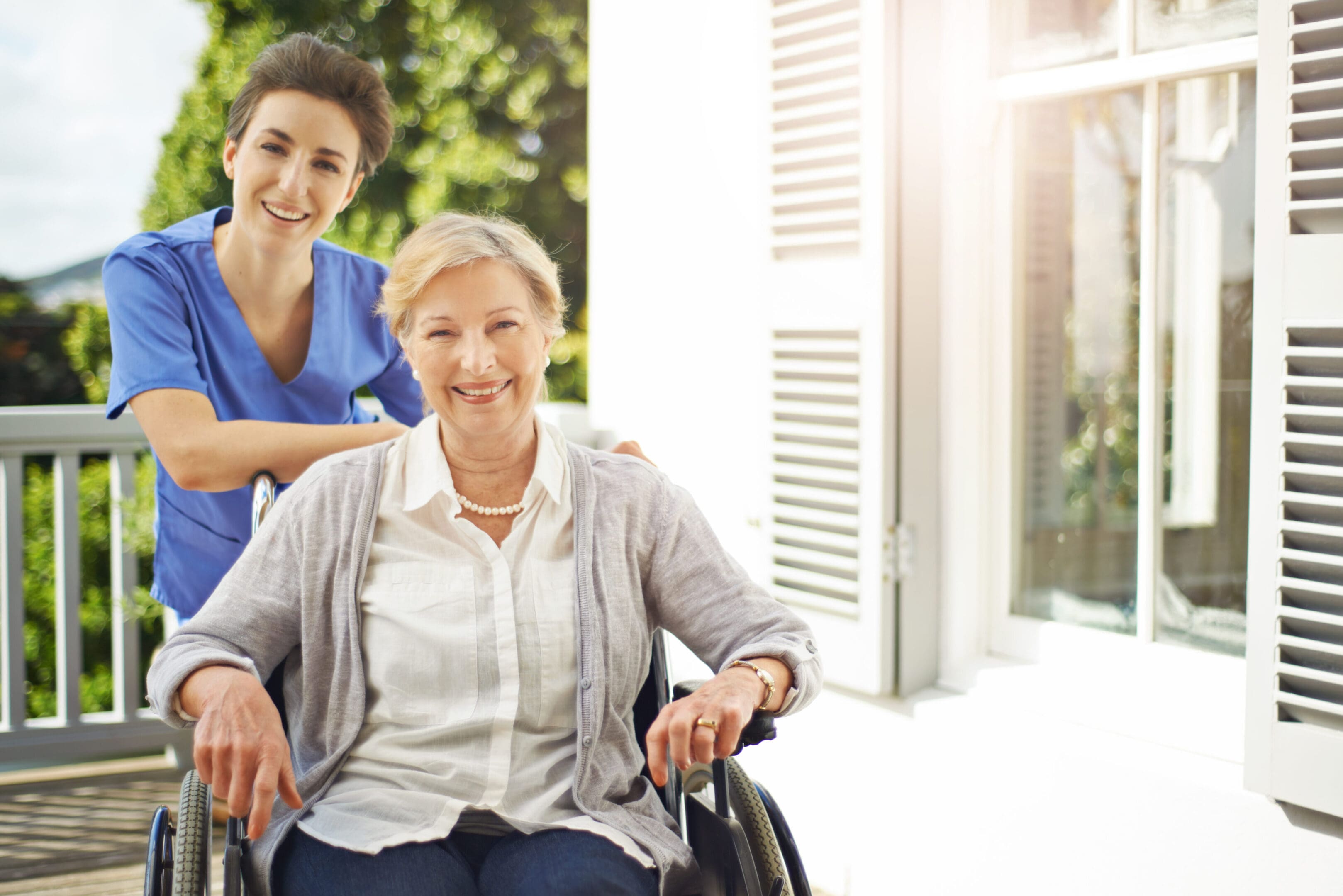 Shot of a nurse pushing her senior patient in a wheelchair