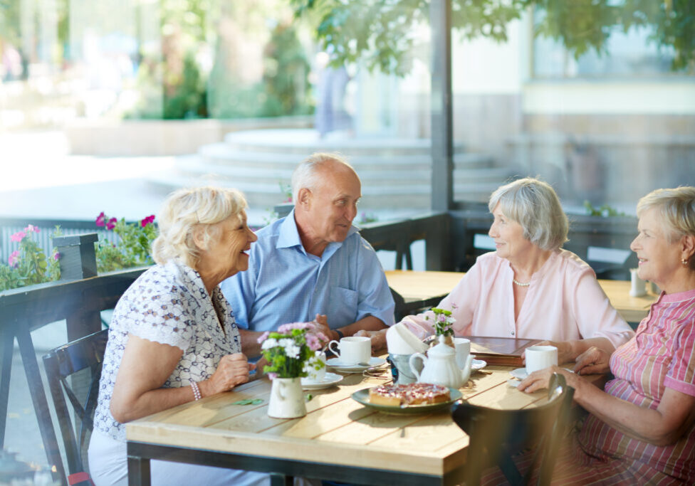 Seniors eating in a senior-friendly restaurant in Glen Cove, NY